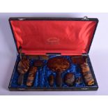 AN EARLY 20TH CENTURY YAMATO AND CO HONG KONG CASED TORTOISESHELL DRESSING TABLE SET carved with dr