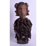 AN AFRICAN TRIBAL VOODOO RUSTY NAIL LACQUERED WOOD FIGURE modelled with two heads with two opposing