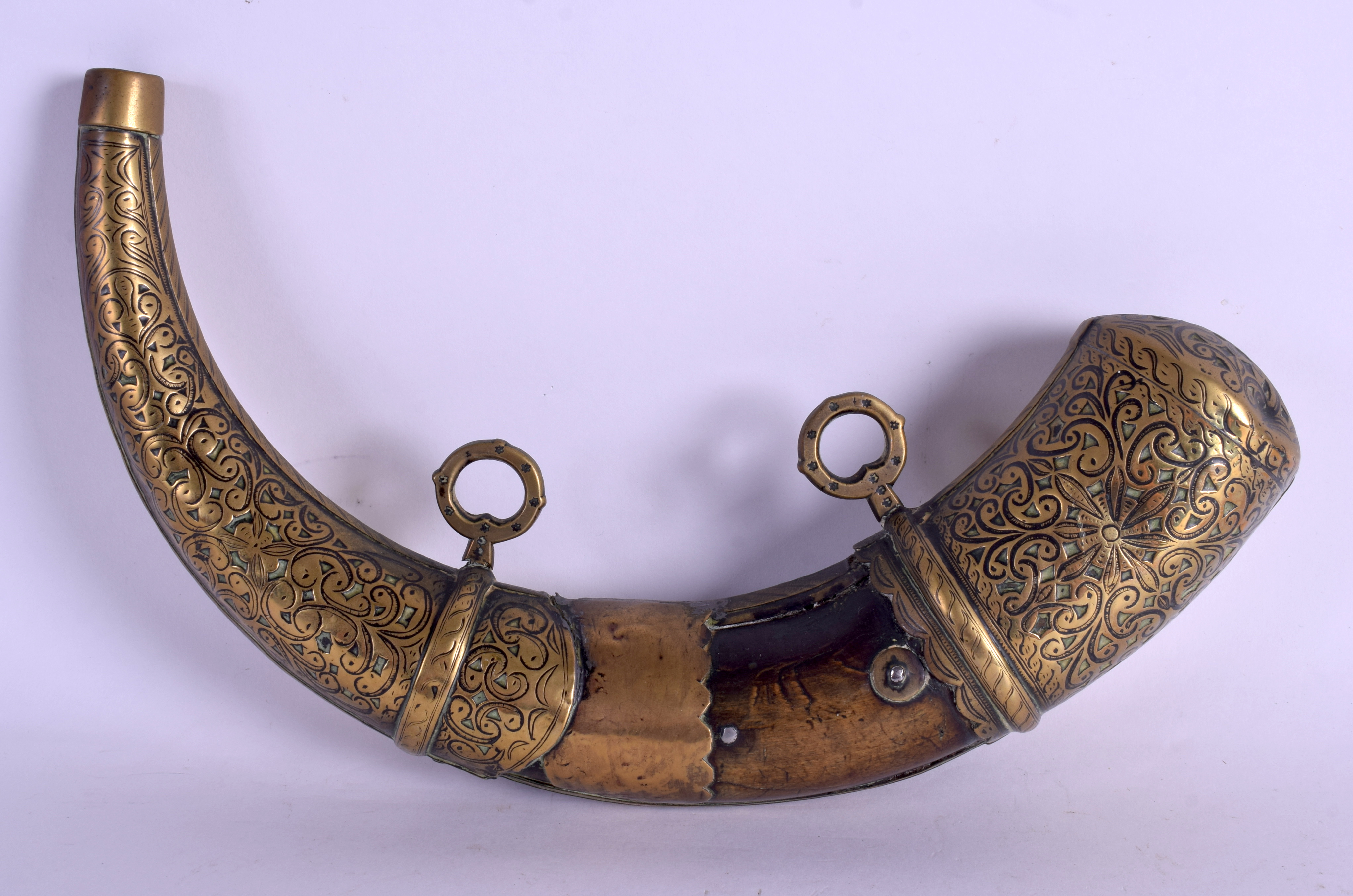 A RARE 18TH CENTURY MIDDLE EASTERN MILITARY POWDER HORN with brass mounts. 33 cm x 20 cm.