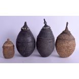 FOUR AFRICAN NAMIBIAN TRIBAL OVOID CARRIERS AND COVERS. Largest 30 cm high. (4)