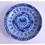 A 19TH CENTURY CHINESE BLUE AND WHITE SCALLOPED DISH bearing Kangxi marks to base. 15 cm wide.