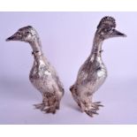 A PAIR OF ANTIQUE CONTINENTAL SILVER FIGURES OF DUCKS modelled in an aggressive stance. 18 oz. 25 c