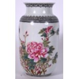A CHINESE FAMILLE ROSE PORCELAIN VASE BEARING QIANLONG MARKS, decorated with birds amongst foliage.
