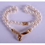 AN 18CT GOLD MISAKI DIAMOND AND PEARL NECKLACE. 32 cm long.