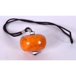 AN AMBER BOULDER NECKLACE, of naturalistic form. Boulder 5.5 cm wide.