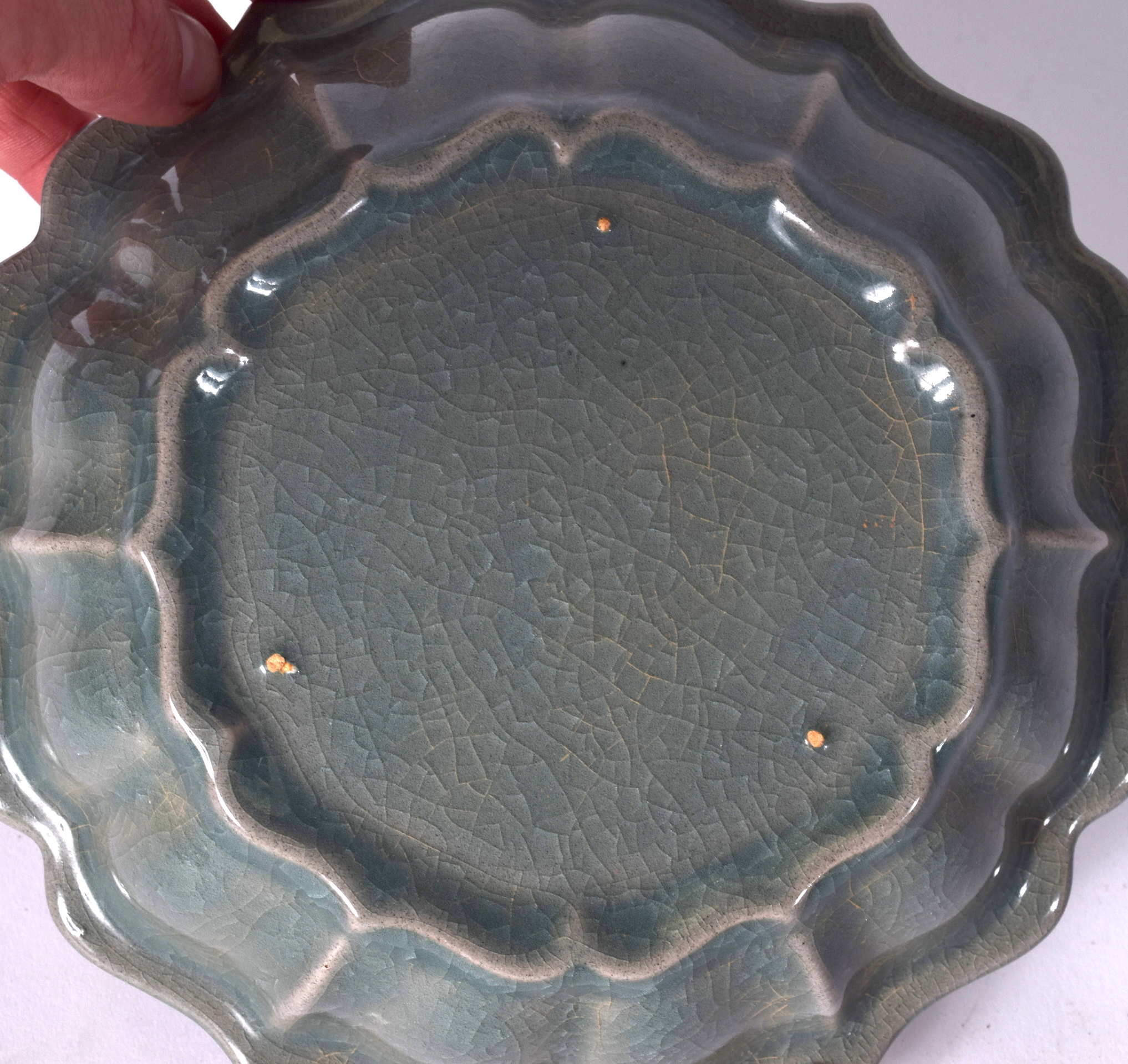 A CHINESE CELADON GLAZED PORCELAIN DISH, lobed in form. 19.5 cm wide. - Image 2 of 2