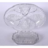 A 19TH CENTURY OVAL LEAD CYSTAL GLASS DISH WITH FAN CUT BORDER, together with a smaller dish. Large