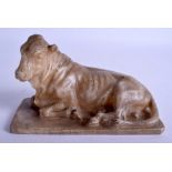 AN 18TH CENTURY CONTINENTAL CARVED ALABASTER FIGURE OF A RECUMBENT BULL probably Italian, modelled