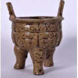 A CHINESE TWIN HANDLED POTTERY CENSER, decorated in relief with taotie mask heads. 11.5 cm high.