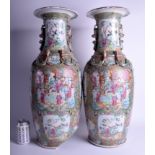 A VERY LARGE PAIR OF 19TH CENTURY CHINESE CANTON FAMILLE ROSE PORCELAIN VASE Qing, painted with fig