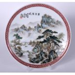 A CHINESE FAMILLE ROSE PORCELAIN DISH, decorated with a mountainous landscape, signed. 23 cm wide.