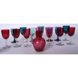 A GROUP OF GREEN GLASESS, together with cranberry glassware. (qty)