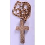 A 9CT GOLD CROSS with gold chain. 3 grams.