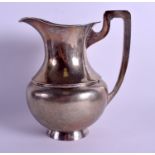 A LATE 19TH CENTURY CHINESE EXPORT HAMMERED SILVER JUG. 616 grams. 24 cm x 18 cm.