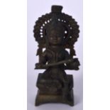 AN INDIAN BRONZE BUDDHA, together with removable shrine. 12 cm high.