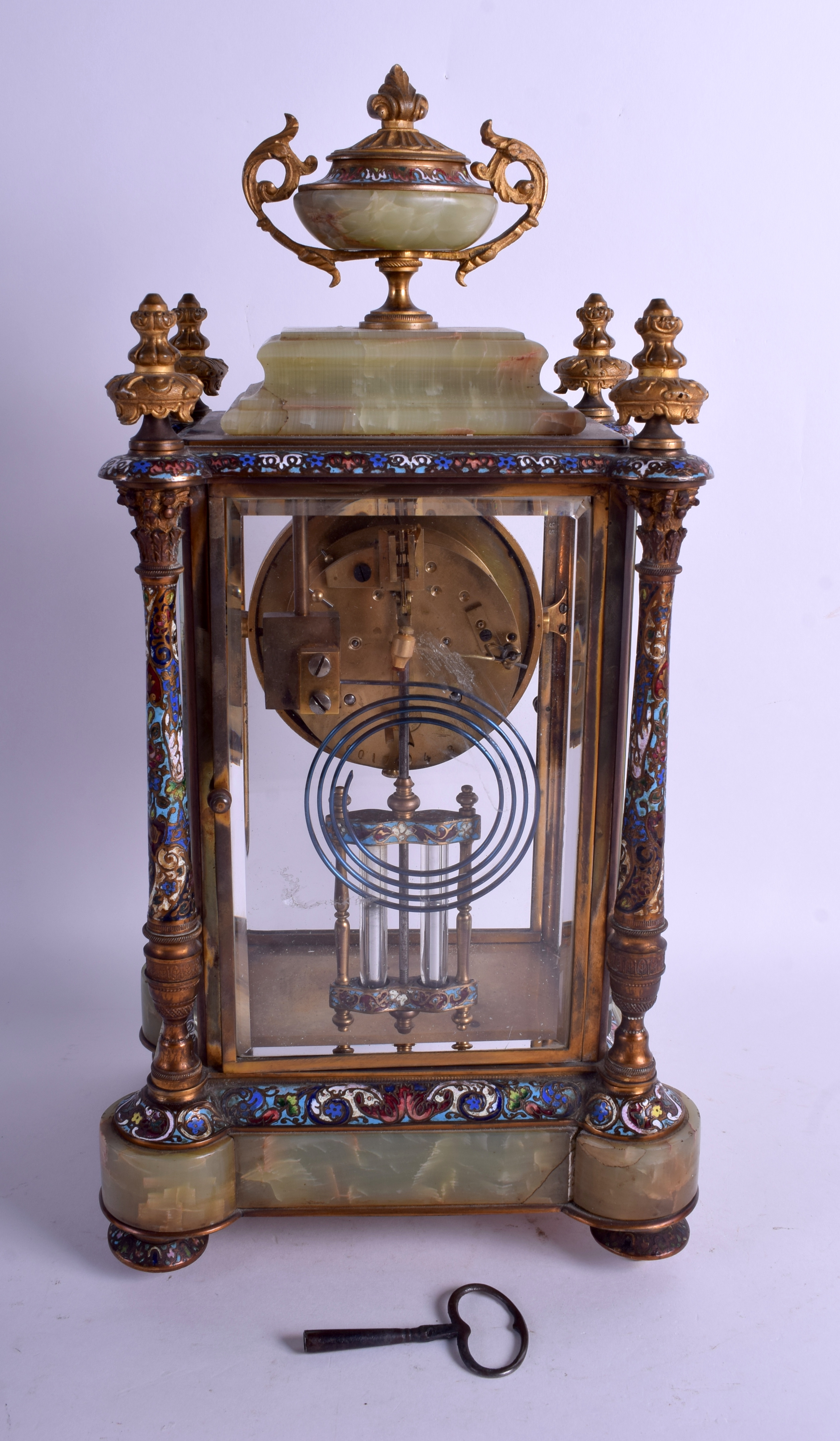 A 19TH CENTURY FRENCH ONYX CHAMPLEVÉ ENAMEL AND ORMOLU MANTEL CLOCK decorated with foliage. 40 cm x - Image 2 of 2