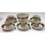 A 19TH CENTURY ENGLISH PORCELAIN PART TEA SERVICE, decorated with gilt foliage. (qty)
