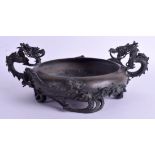 A 19TH CENTURY JAPANESE MEIJI PERIOD TWIN HANDLED BRONZE CENSER overlaid with two dragons. 28 cm wi