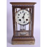 AN EARLY 20TH CENTURY FRENCH BRASS AND CHAMPLEVÉ ENAMEL REGULATOR MANTEL CLOCK decorated with folia