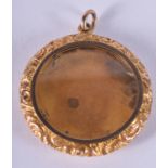 AN ANTIQUE 9CT GOLD LOCKET. 5.8 grams. 3.5 cm wide.