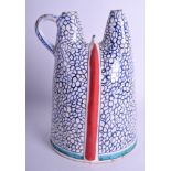 A RARE TURKISH KUTAHYA POTTERY WATER FLASK painted with blue swirls and a red banding. 23 cm x 15 c