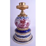 A LARGE 19TH CENTURY FRENCH SEVRES PORCELAIN LAMP painted in puce with landscapes. 32 cm x 16 cm.