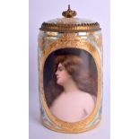 AN EARLY 20TH CENTURY VIENNA PORCELAIN TANKARD painted with a pretty female. 13 cm high.