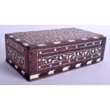AN EARLY 20TH CENTURY ANGLO INDIAN IVORY EBONY AND HARDWOOD BOX decorated with foliage. 17 cm x 10