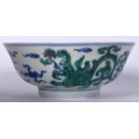 A 20TH CENTURY CHINESE PORCELAIN BOWL BEARING CHENGHUA MARKS, decorated with mythical beasts amongs