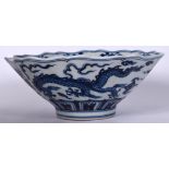 A CHINESE BLUE AND WHITE PORCELAIN BOWL BEARING XUANDE MARKS, painted with a five claw dragon among