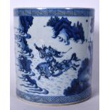 A LARGE 20TH CENTURY CHINESE BLUE AND WHITE PORCELAIN BRUSH POT, decorated with figures in a landsc