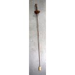 AN ANTIQUE SWORD, formed with a knight head pommel. 105 cm long.