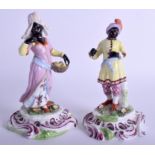 A PAIR OF 19TH CENTURY CONTINENTAL PORCELAIN FIGURES OF NUBIANS modelled in the Chelsea style. 16 c