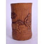 A SMALL EARLY 20TH CENTURY CHINESE CARVED BAMBOO BRUSH POT. 9.25 cm high.