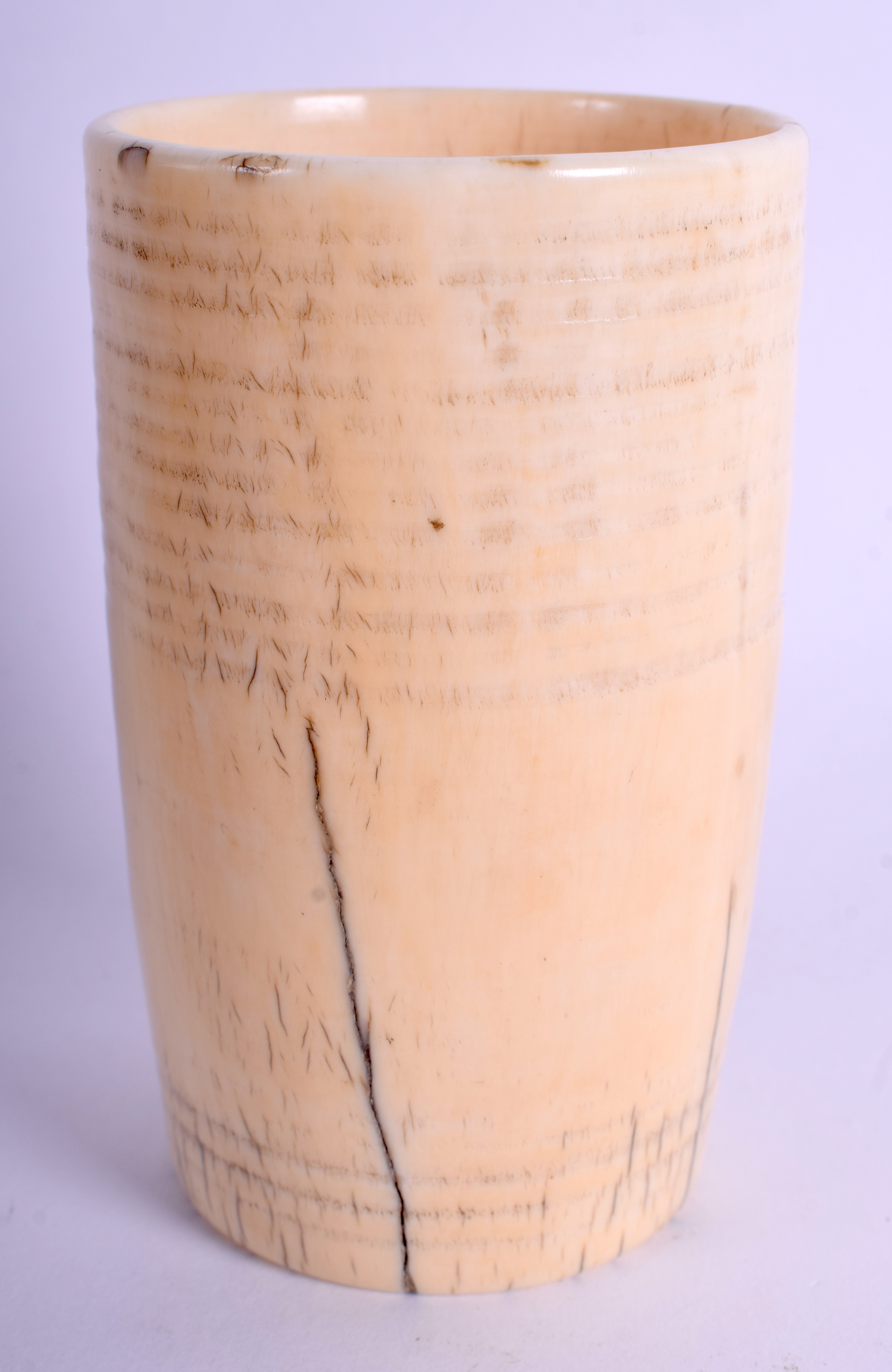 A 17TH CENTURY EUROPEAN CARVED IVORY RIBBED BEAKER C1670 of plain form. 171 grams. 9.5 cm x 5.5 cm. - Image 2 of 3