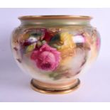 AN ANTIQUE ROYAL WORCESTER HADLEY JARDINIÈRE painted with bold roses. 24 cm x 20 cm.