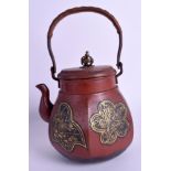 A 19TH CENTURY JAPANESE MEIJI PERIOD LACQUERED TEAPOT AND COVER decorated with gilt foliage. 20 cm