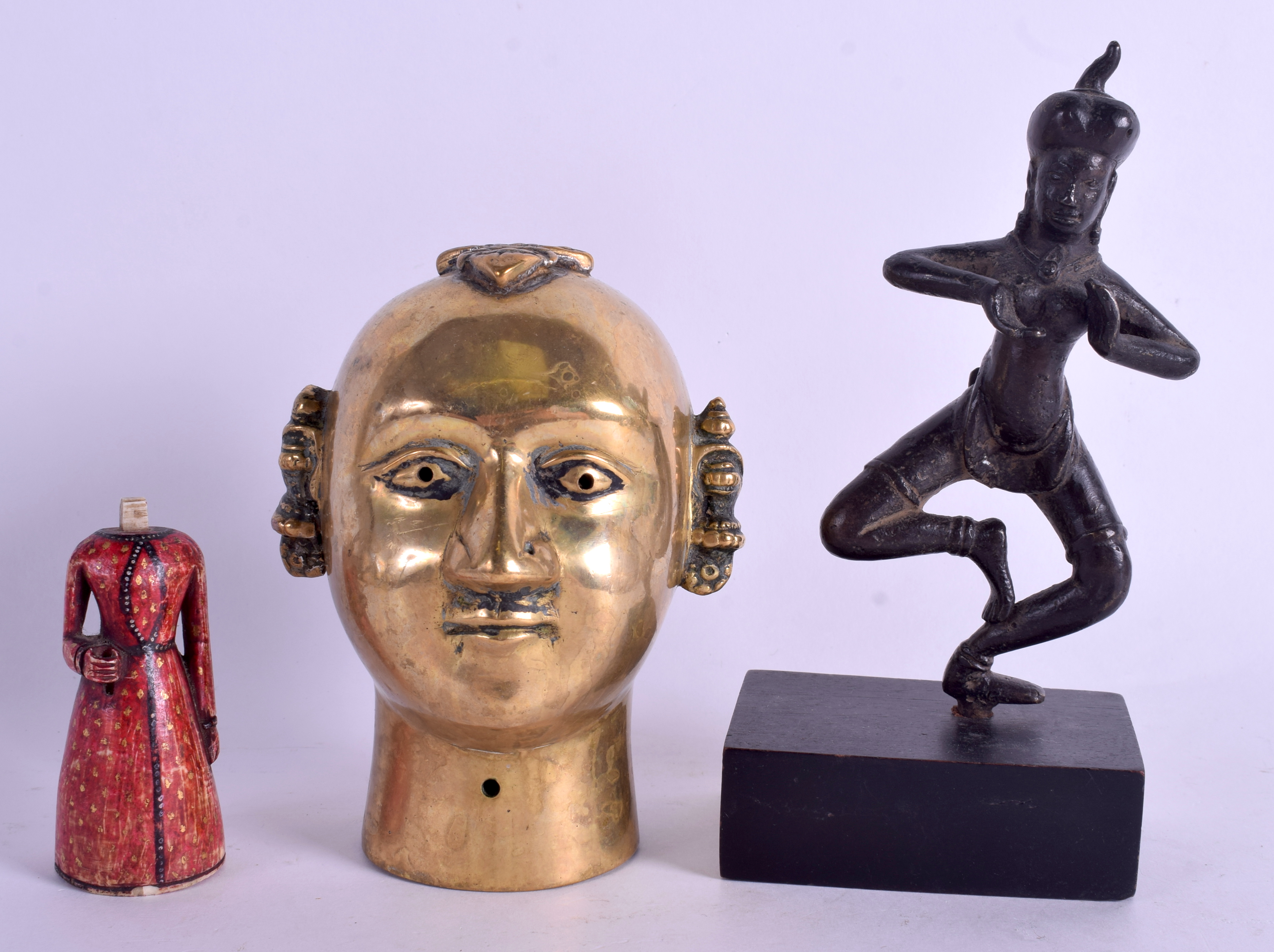 AN 18TH CENTURY INDIAN BRASS BUDDHA HEAD together with an Eastern bronze deity & an 18th CENTURY ca