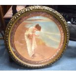 A FRAMED ANTIQUE COLOURED PRINT, depicting a female on the beach. 60 cm wide.