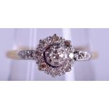 AN 18CT GOLD AND DIAMOND FANCY CLUSTER RING. 3.3 grams. Size R.