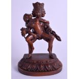 A CHINESE CARVED BOXWOOD EROTIC BUDDHISTIC FIGURE Qing/Republic. 16 cm x 9 cm.