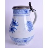 A RARE 17TH CENTURY JAPANESE EDO PERIOD ARITA BLUE AND WHITE JUG C1690 painted with floral sprays.