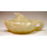 A CHINESE WHITE HARDSTONE TEA POT, naturalistic in form. 19 cm wide.