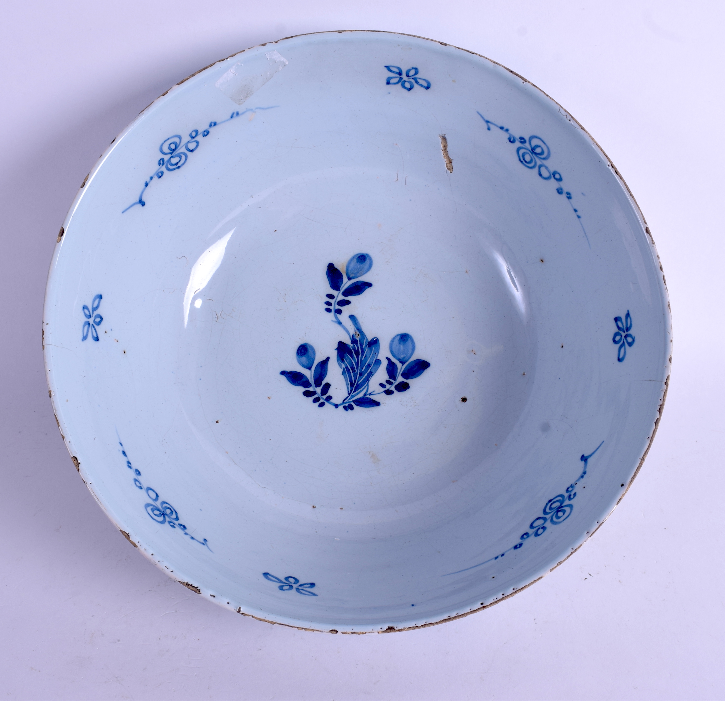 A MID 18TH CENTURY ENGLISH LONDON DELFT CIRCULAR BOWL C1750 painted with flowers and vines. 26.5 cm - Image 3 of 4