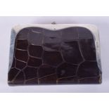 A VINTAGE SILVER MOUNTED LEATHER CROC SKIN PURSE. 10 cm x 8 cm.