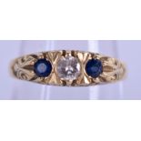 AN 18CT GOLD DIAMOND AND SAPPHIRE RING. 3.7 grams. Size O.