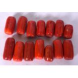 FOURTEEN RED CORAL BEADS, naturalistic. (14)