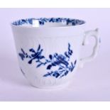 A RARE 18TH CENTURY EARLY HERRINGBONE MOULDED COFFEE CUP painted with the feather mould floral patt