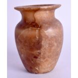 AN EARLY EGYPTIAN ALABASTER JARLET. 9 cm high.