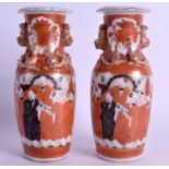 A PAIR OF 19TH CENTURY JAPANESE KUTANI PORCELAIN VASES painted with figures and chilong dragons. 21